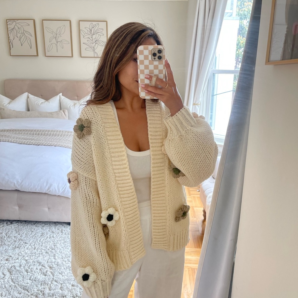 Cozy Cream Knit Sweater with Floral Accents